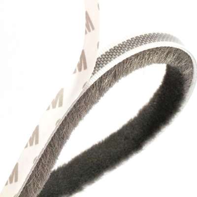 Self-adhesive wool pile weather sealing strip for windows